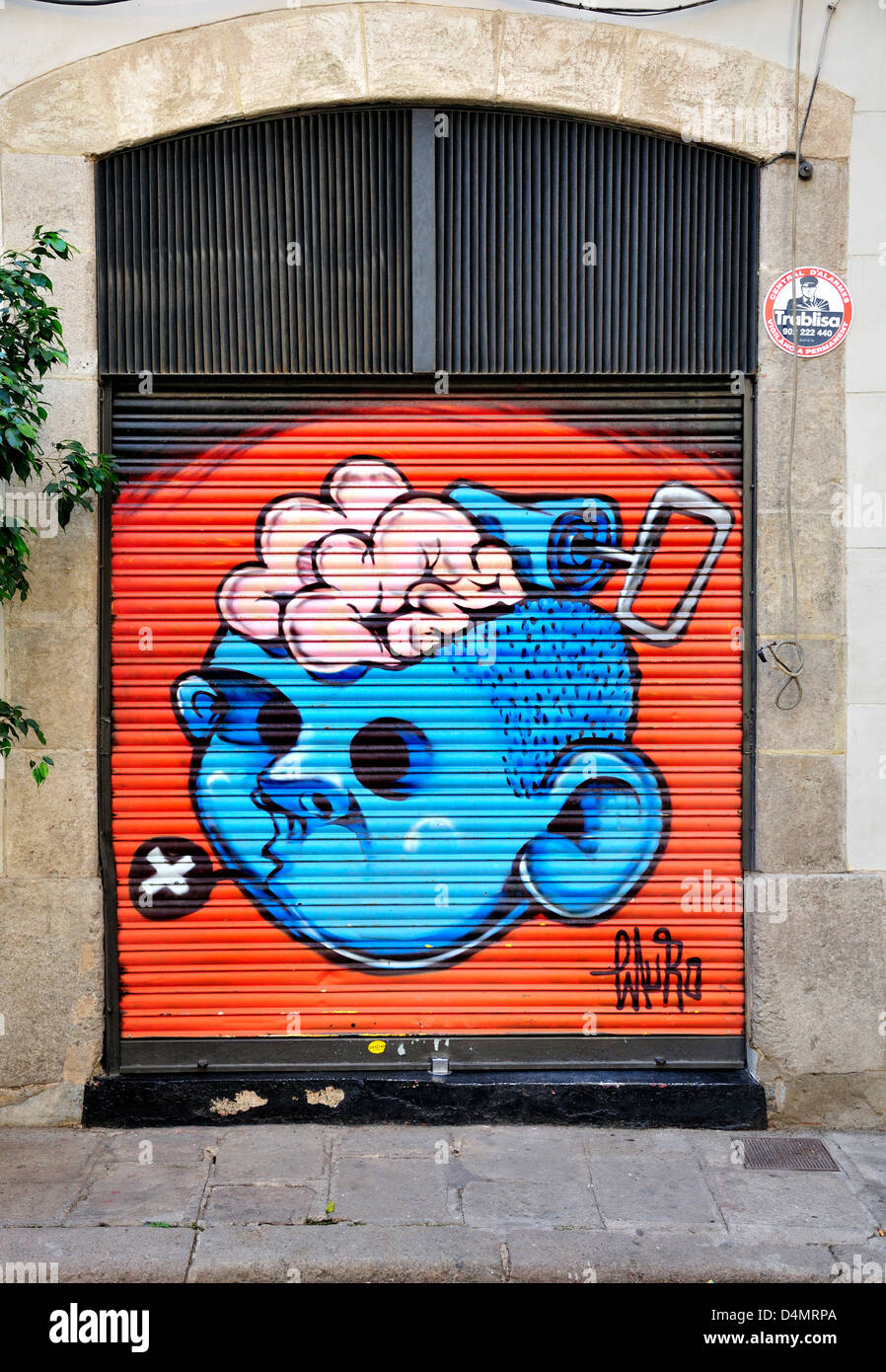 Barcellona, in Catalogna, Spagna. Dipinto di persiane shop - cervello in uscita della testa Foto Stock