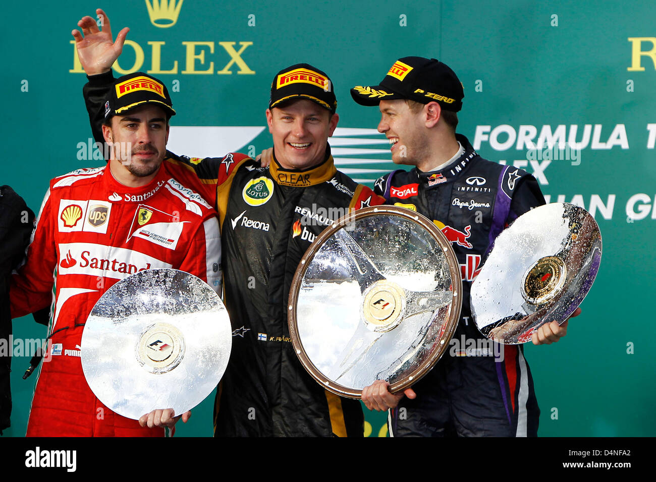Motorsports: FIA Formula One World Championship 2013, il Gran Premio d'Australia, #3 Fernando Alonso (ESP, la Scuderia Ferrari), #7 Kimi Raeikkoenen (FIN, Team Lotus F1), #1 Sebastian Vettel (GER, Infiniti Red Bull Racing), Foto Stock