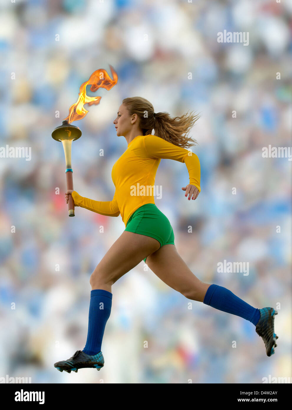 Runner brasiliano che porta torcia olimpica Foto Stock