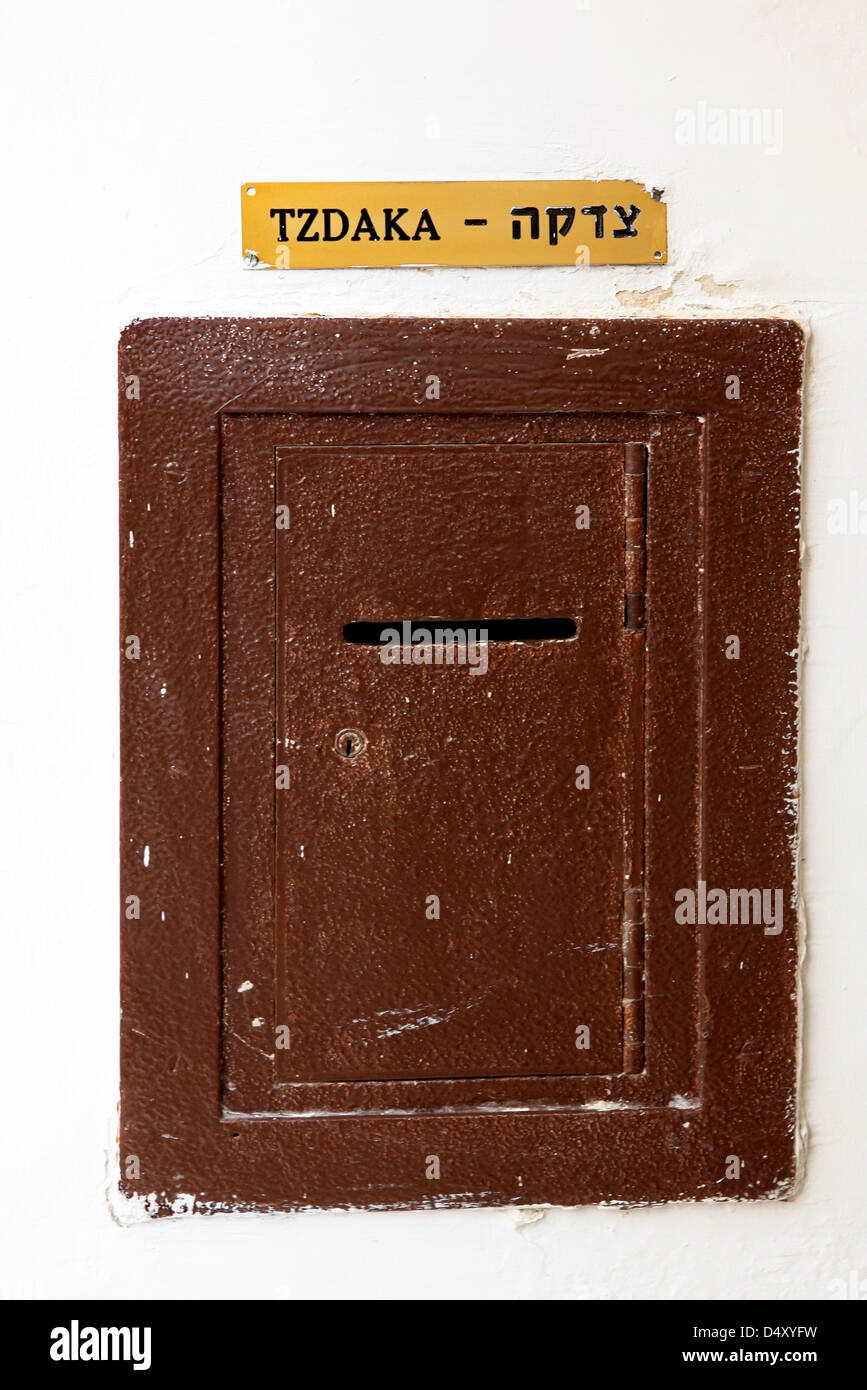 Casella Tzdaka (charity box) Gerusalemme Foto Stock