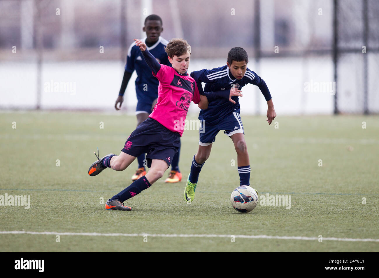 Teen boys soccer azione. Foto Stock