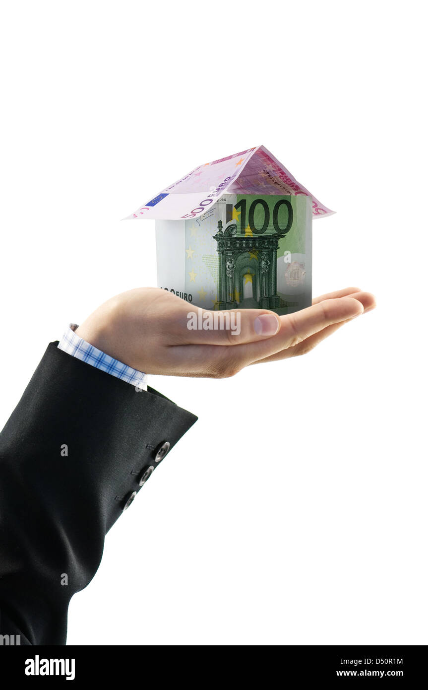 Casa da euro in mano isolato Foto Stock