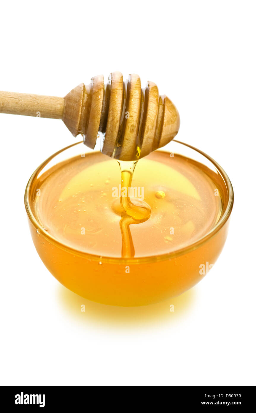 Il miele nel vasetto di vetro isolato Foto Stock