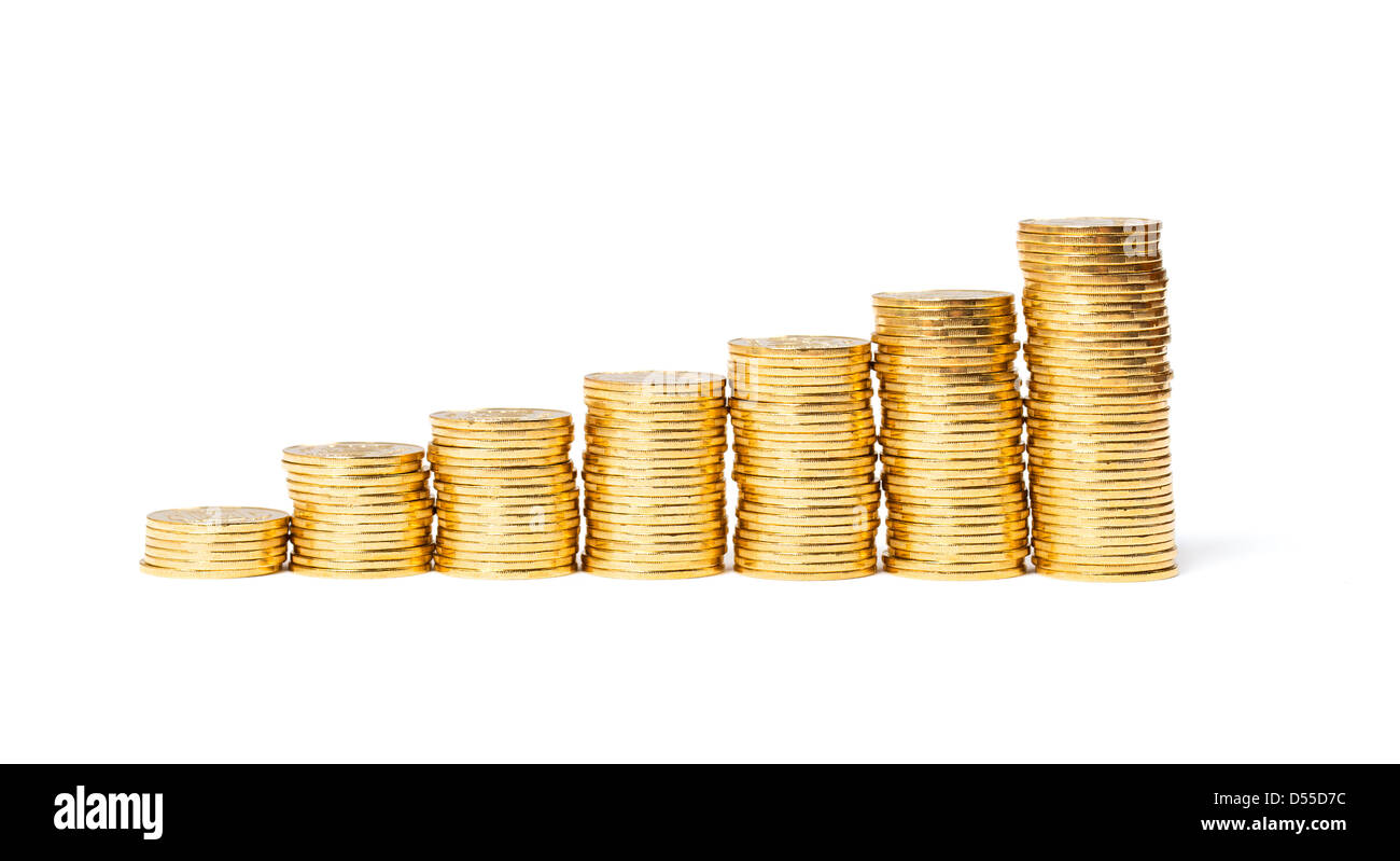 Colonne di monete d'oro isolato su bianco Foto Stock