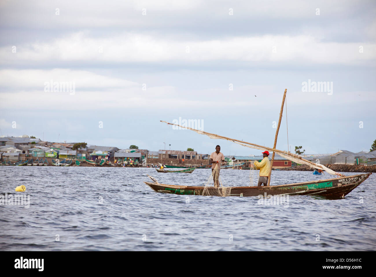 Barca da pesca con Remba isola in background, il lago Victoria, in Kenya. Foto Stock