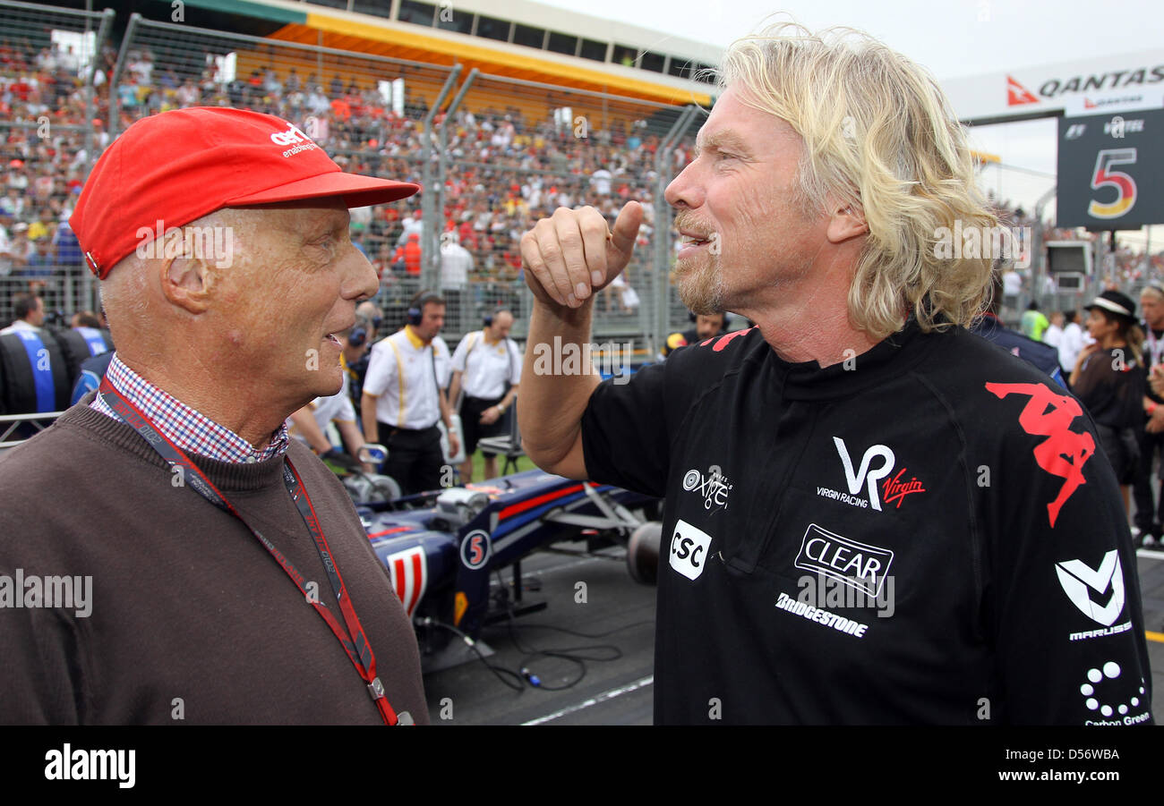 Il boss della Virgin Group e proprietario della Virgin Racing, Richard Branson (R), parla con ex Formula One champion austriaco Niki Lauda in vista del Gran Premio d'Australia all'Albert Park di Melbourne, Australia, 28 marzo 2010. Foto: Jens Buettner Foto Stock