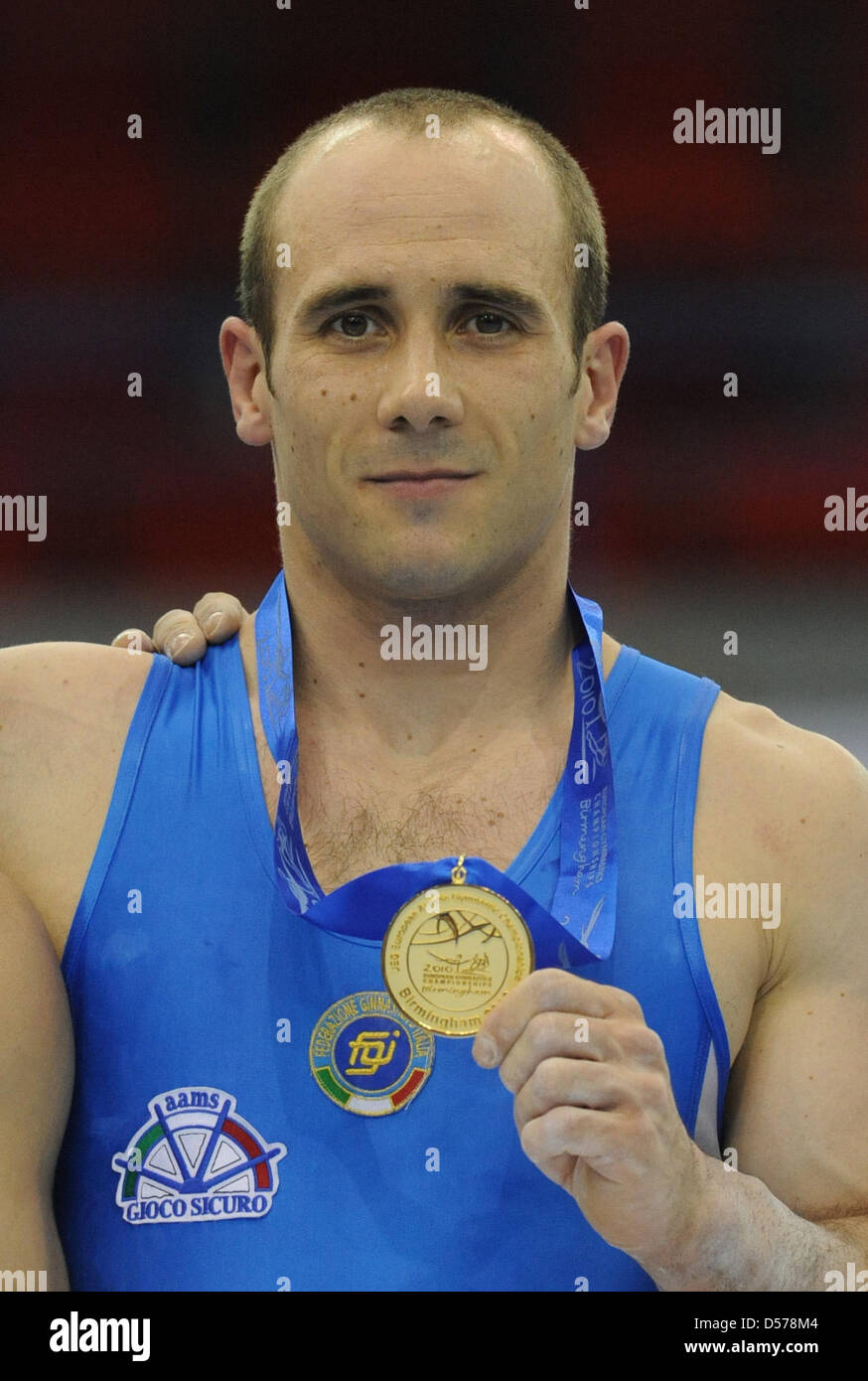 Ginnasta italiano Matteo Morandi sorrisi con la sua goldd medaglia ai Campionati Europei di Ginnastica Artistica a Birmingham, Gran Bretagna, 25 aprile 29010. Foto: Marijan Murat Foto Stock