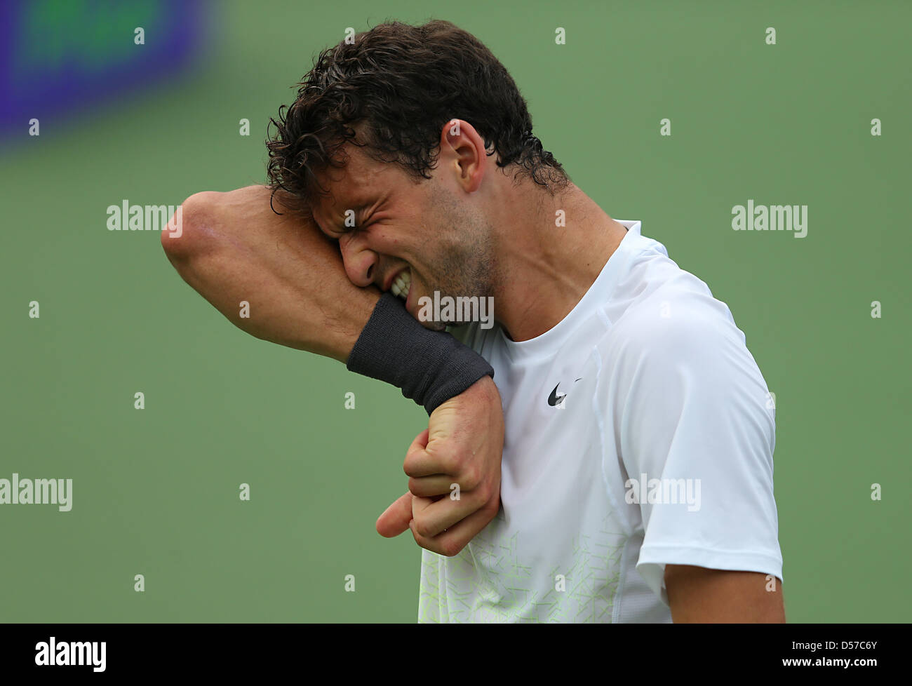 Miami, Florida, Stati Uniti d'America. Xxv Marzo 2013. Grigor Dimitrov di Bulgaria reagisce durante il Sony Open 2013. Credito: Mauricio Paiz / Alamy Live News Foto Stock