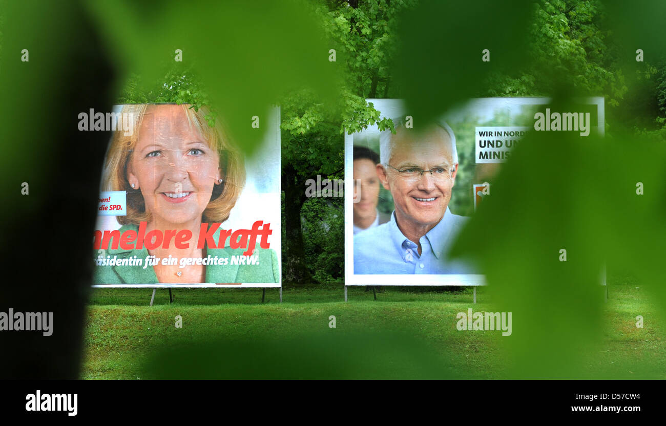 Elezione dei poster di Juergen Ruettgers (R), top candidato per il Partito Democratico Cristiano CDU e Hannelore Kraft, top candidato per il Partito Socialdemocratico SPD, per le elezioni regionali in stato tedesco della Renania settentrionale-Vestfalia, a Duesseldorf in Germania, 07 maggio 2010. Le elezioni si svolgeranno il 09 maggio 2010. Foto: JULIAN STRATENSCHULTE Foto Stock