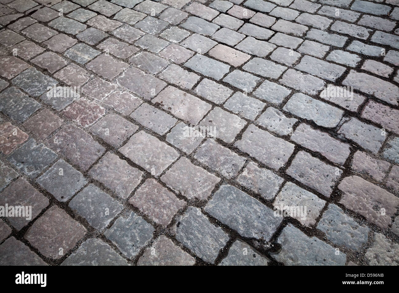 Texture di sfondo di granito vecchia strada acciottolata Foto Stock