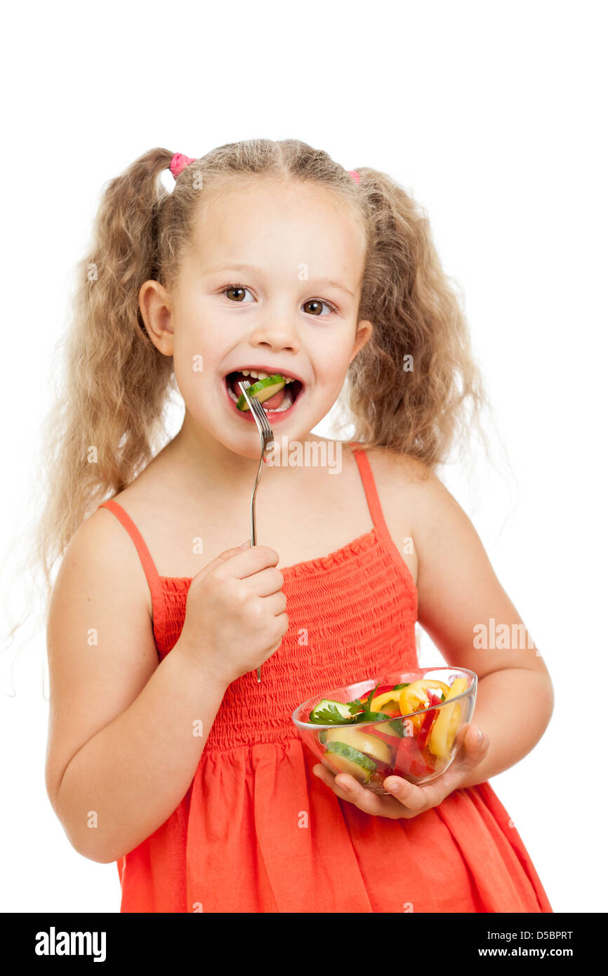 Bambino ragazza di mangiare cibo sano e verdure Foto Stock