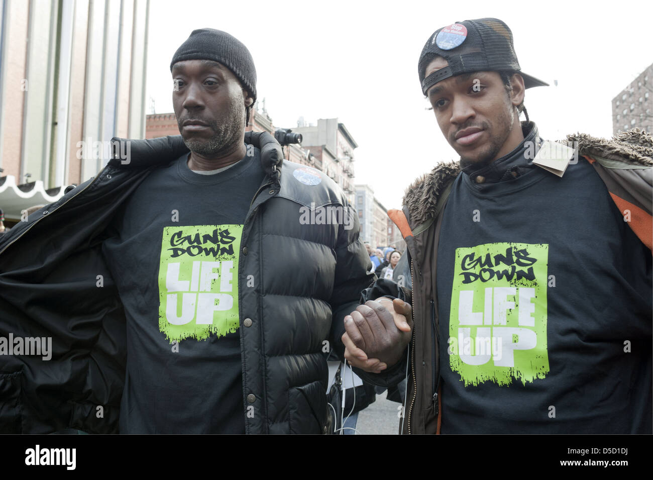 Attivisti locali al raduno anti-pistola nel quartiere Harlem di Manhattan, il 21 marzo 2013. Foto Stock
