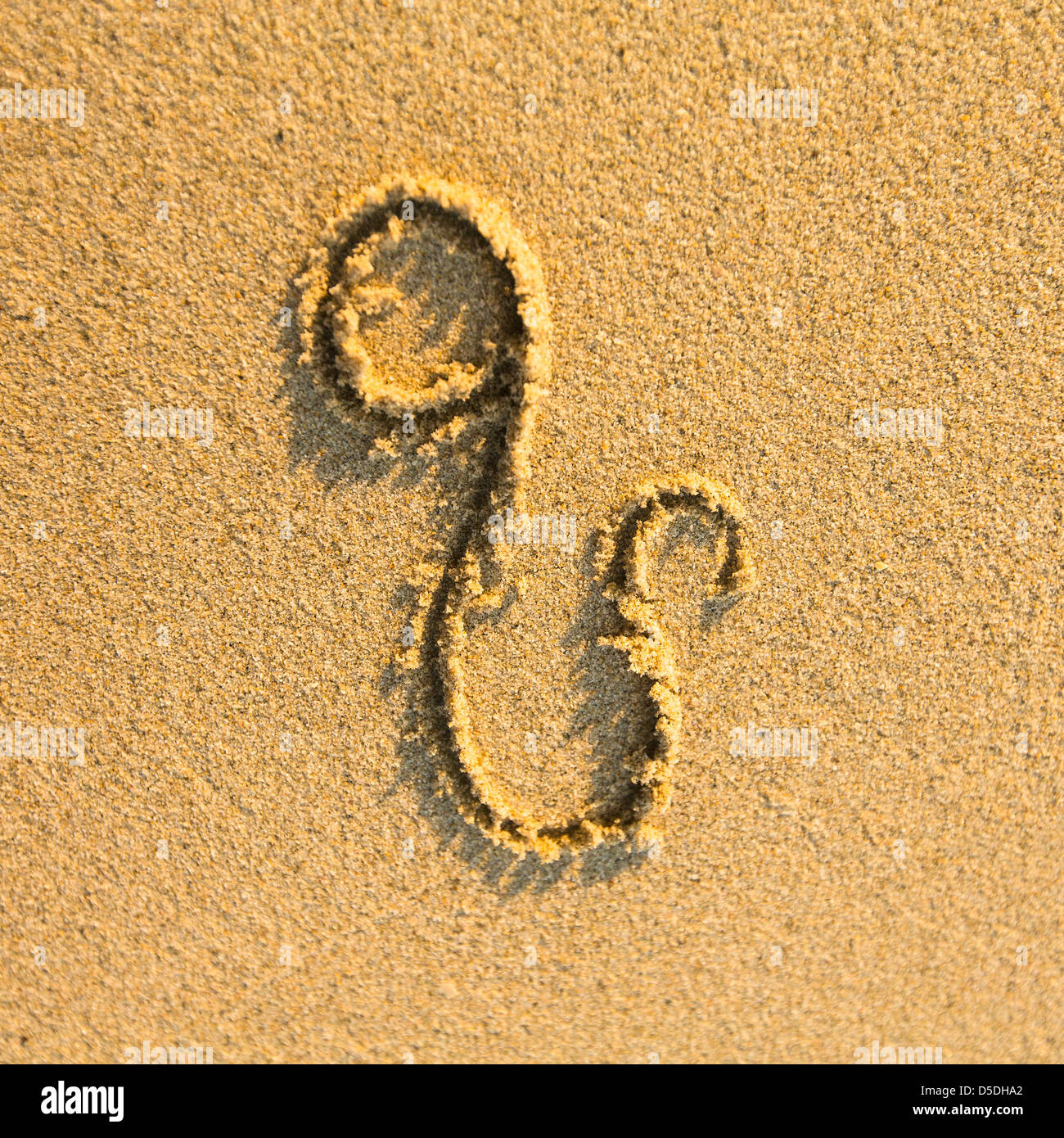 Segno Zodiacale Leone, tracciata sul fratturato spiaggia di sabbia. (Segni zodiacali serie) Foto Stock