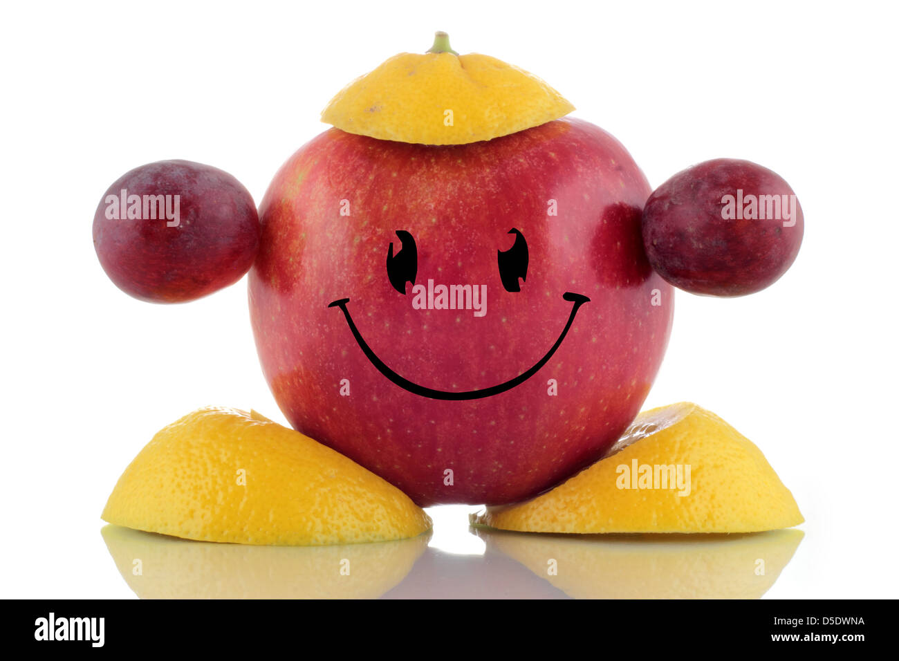 Felice dieta. Divertente personaggio di frutta. Foto Stock