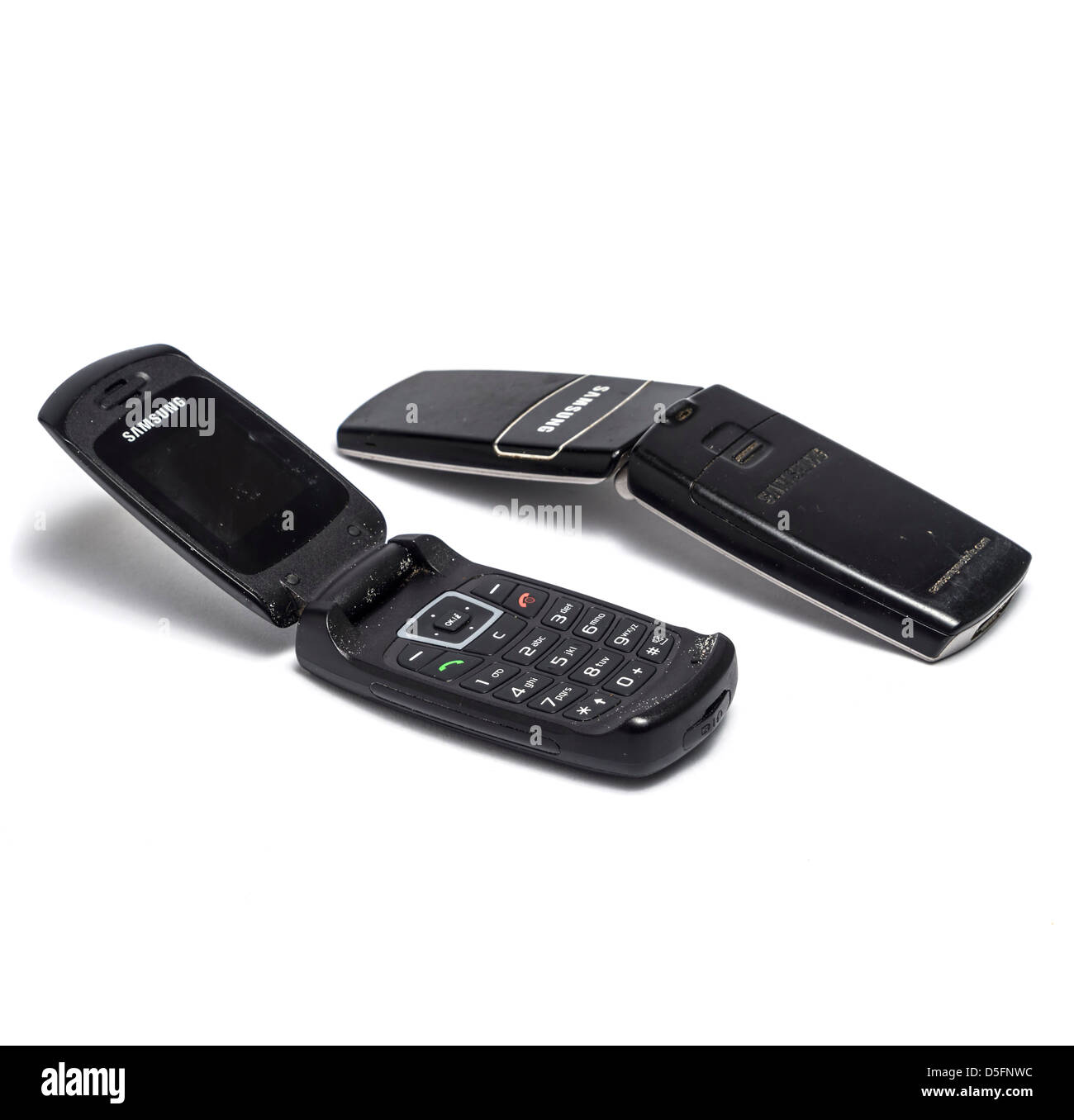 Due vecchi Samsung cellulari isolate su sfondo bianco Foto Stock