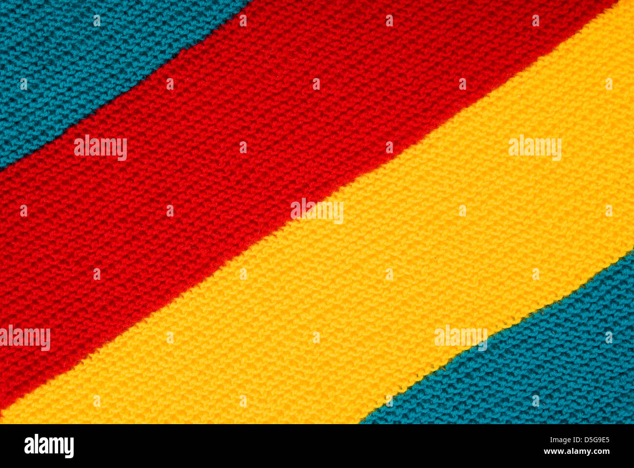 Ricamo in lana con tre colori come sfondo Foto Stock