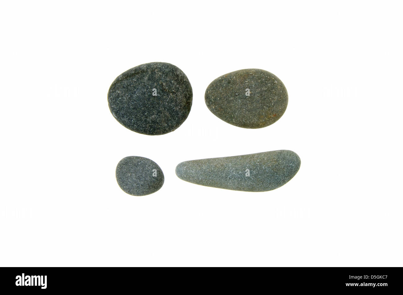 Quattro liscia, round spiaggia di pietre di Maine di granito e di scisto. Foto Stock Quattro liscia, round spiaggia di pietre di Maine di granito e di scisto. Foto Stock