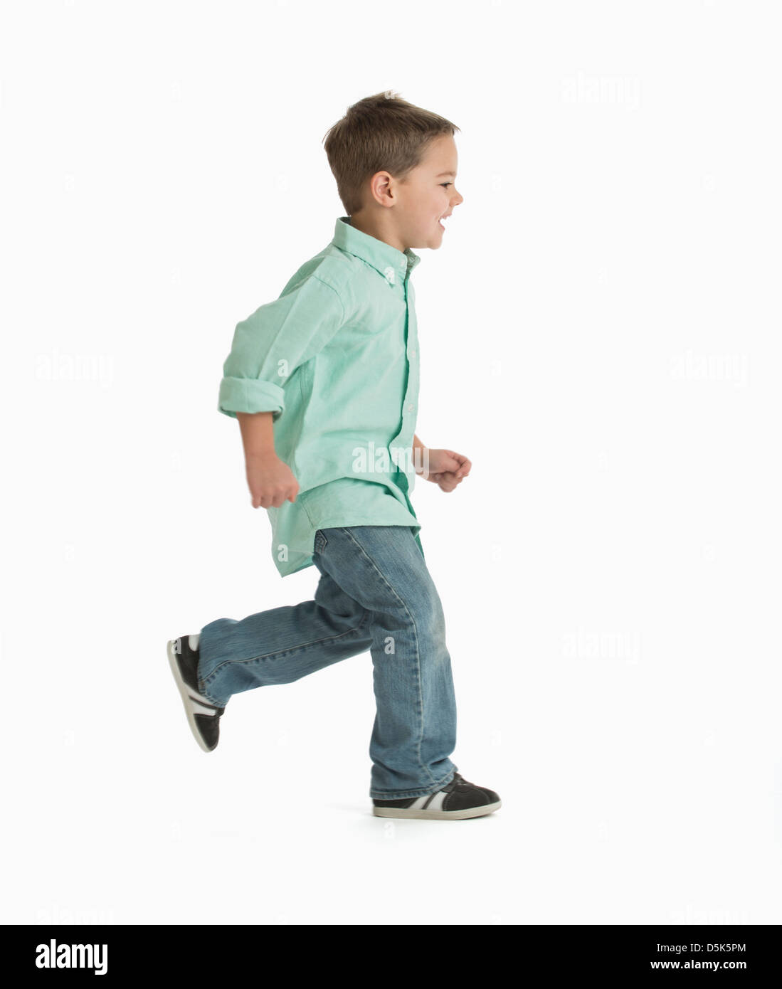 Ragazzo (4-5) in esecuzione Foto Stock