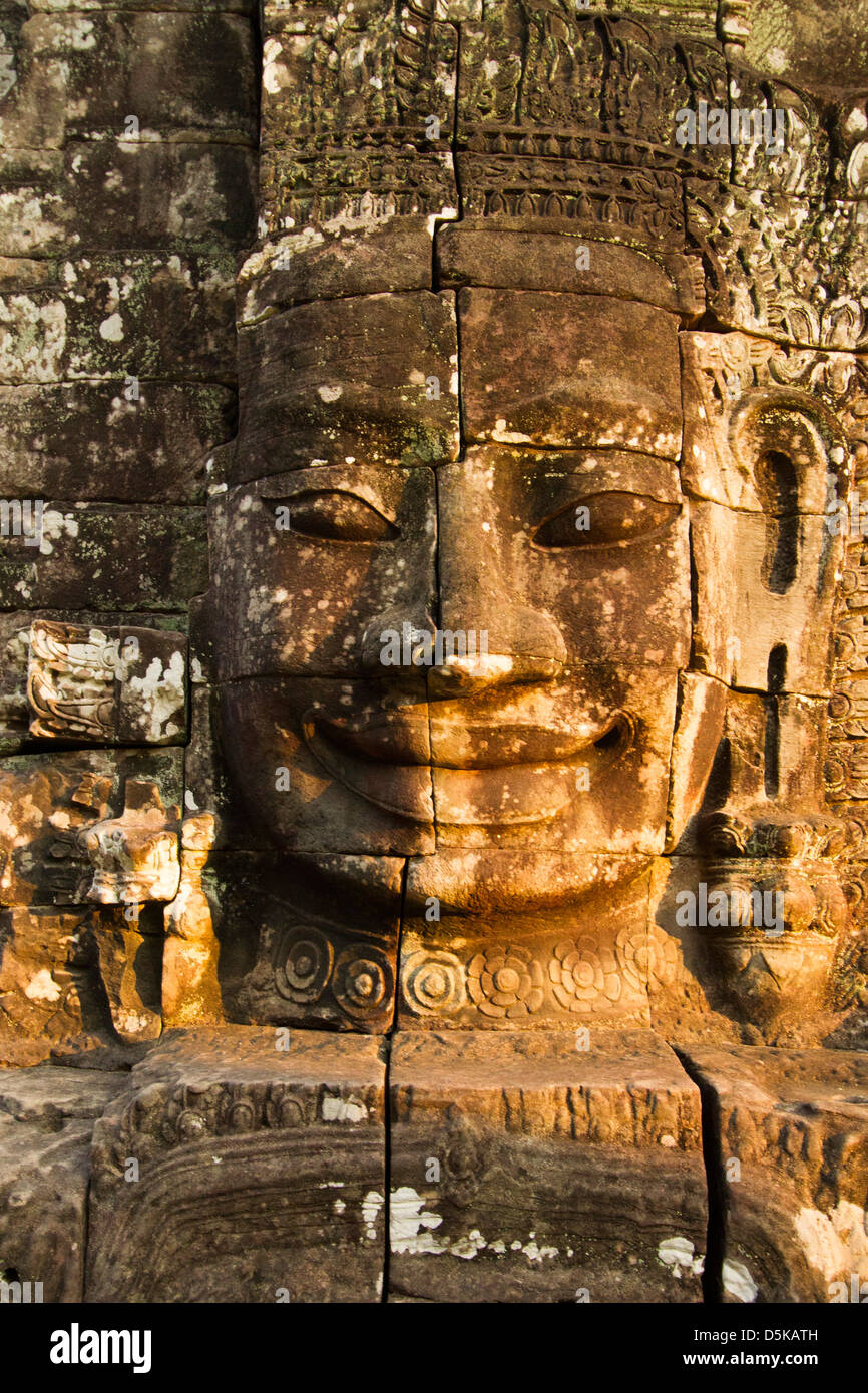 Buddha Sorridente al tempio Bayon in Cambogia Foto Stock
