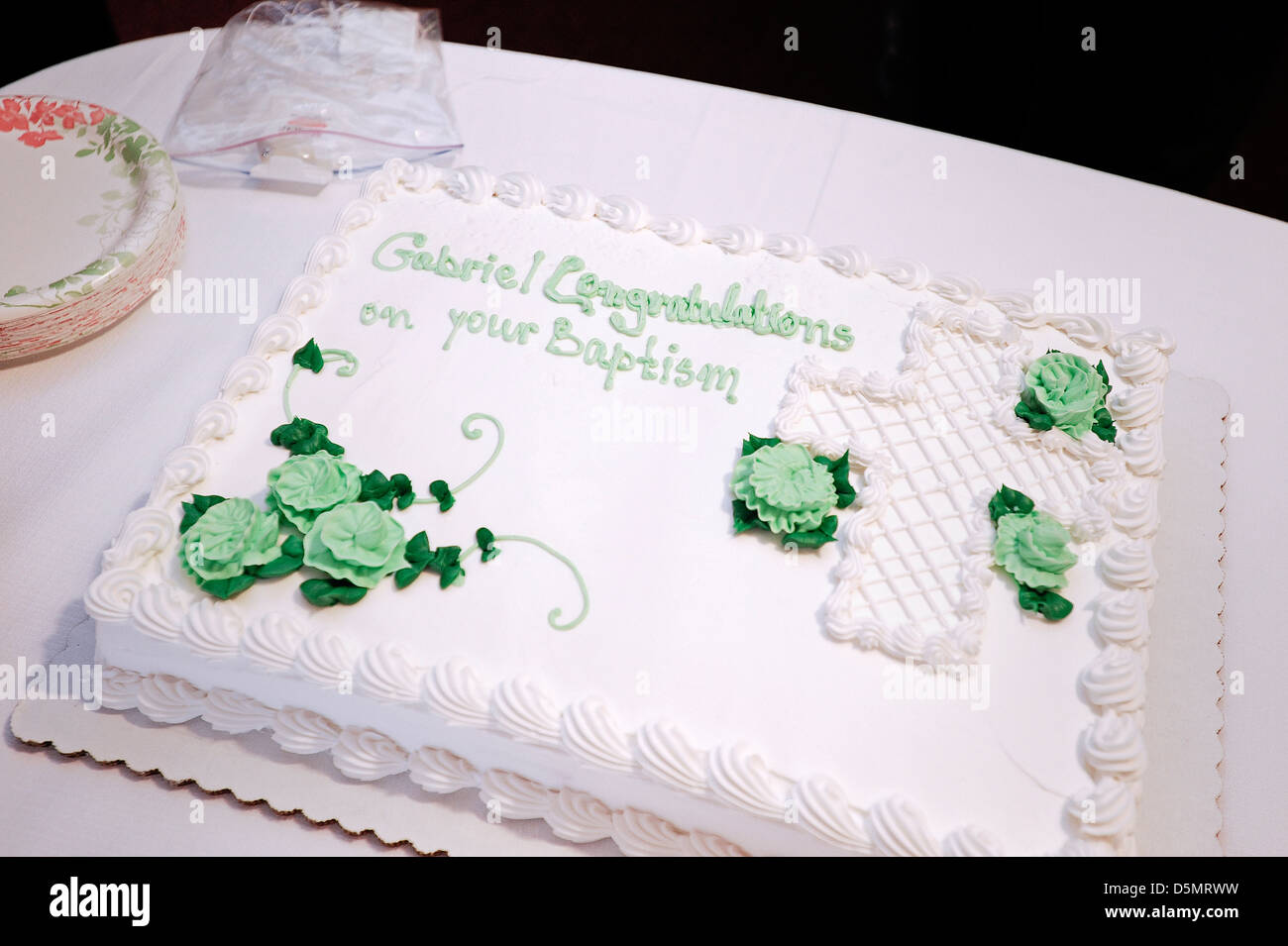 Torta per celebrare il battesimo. Foto Stock