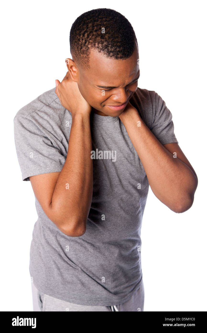 Sportivo da uomo con dolorose lesioni sportive sul collo in grigio maglietta e pantaloni della tuta, isolata. Foto Stock