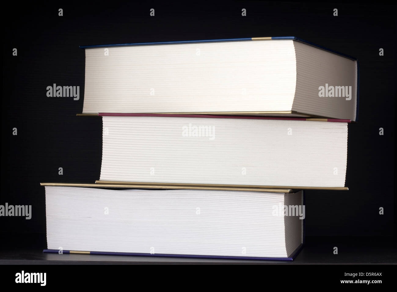 Pila di libri il concetto di sfondo Foto Stock