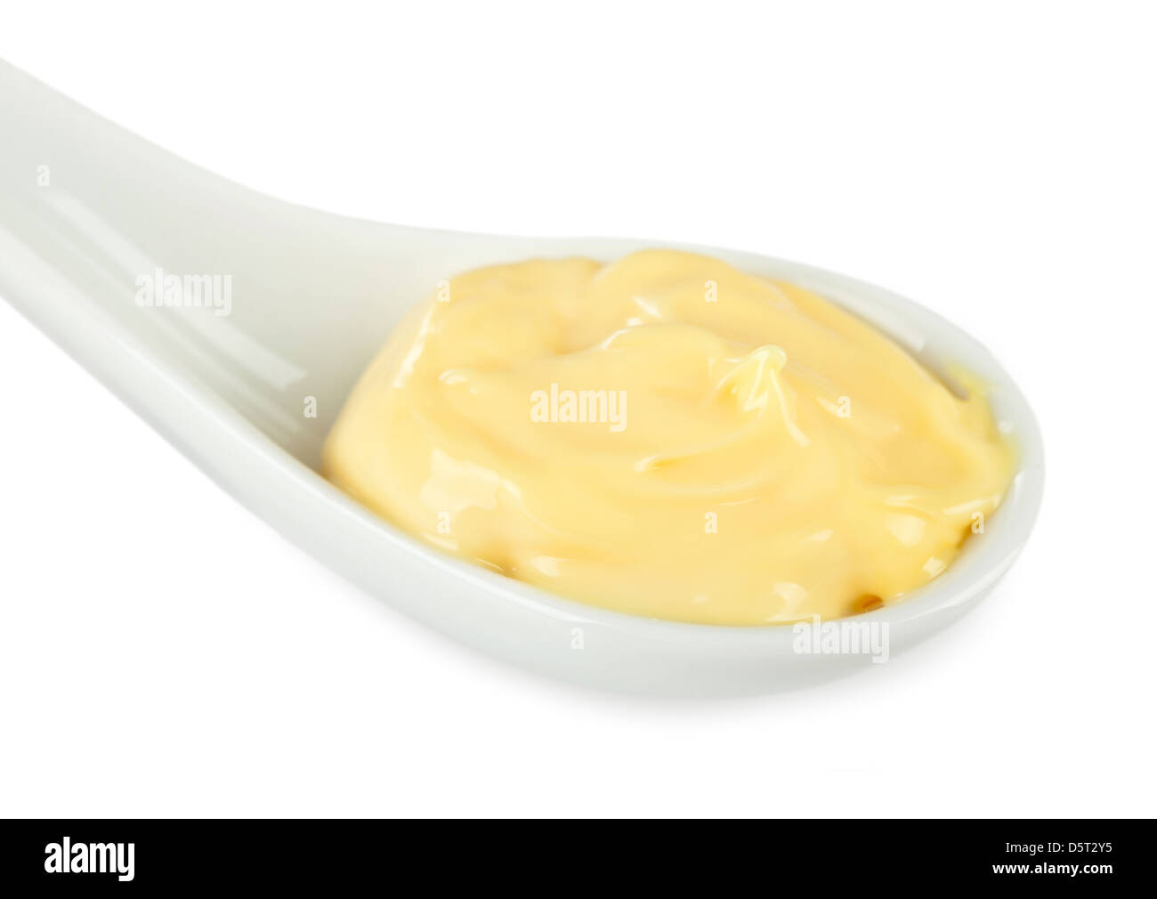 Salsa Mayonnaisel in ceramica bianca cucchiaio Foto Stock