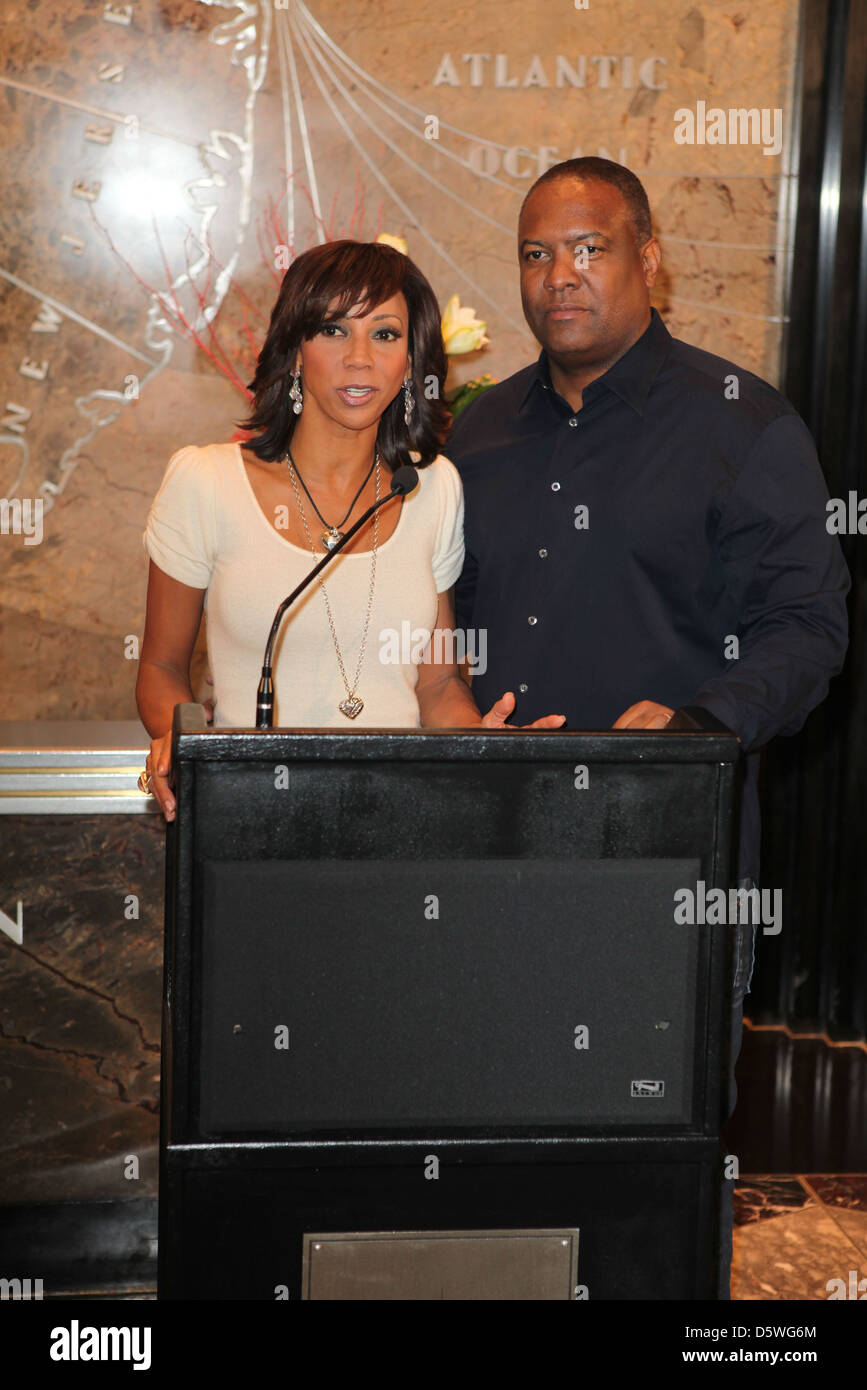 Holly Robinson Peete, Rodney Peete attrice Holly Robinson Peete e la NFL Star Rodney Peete luce l'Empire State Building in Foto Stock