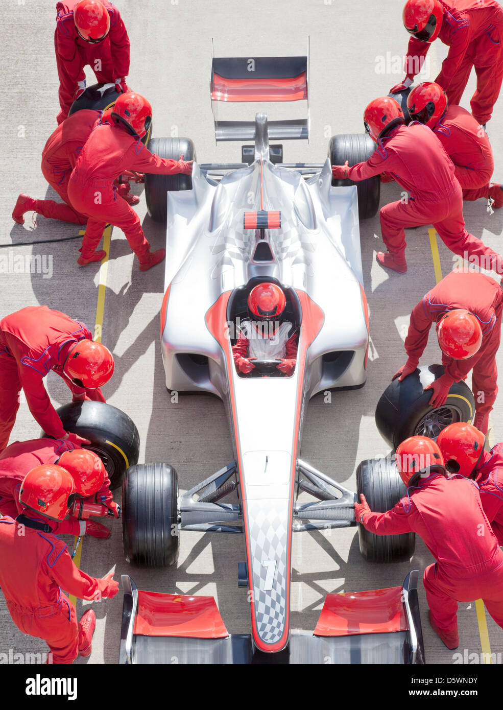 Racing team lavora al pit stop Foto Stock