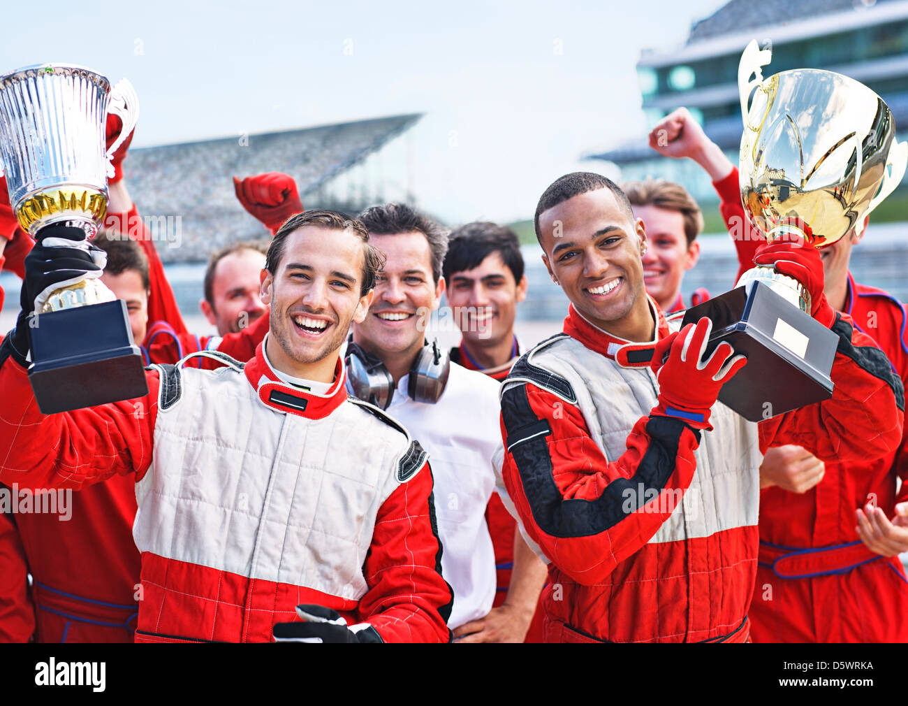 Piloti e team a fare il tifo per via Foto Stock