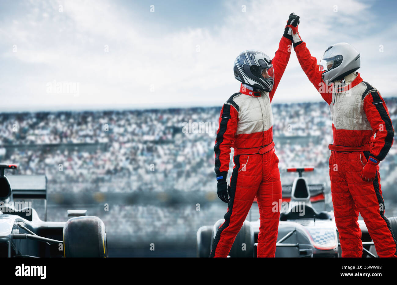 I piloti a fare il tifo per via Foto Stock