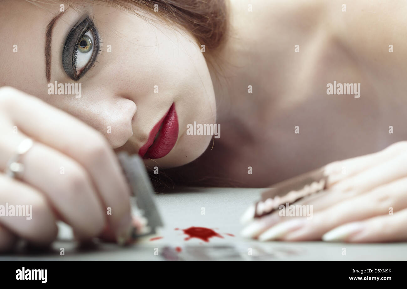 Non giocare con il rasoio Foto Stock