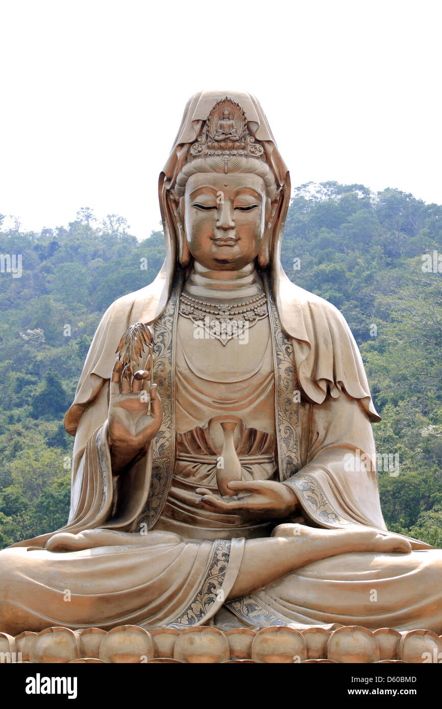 La divinità cinese scultura di Guan Yin,di ottone. Foto Stock