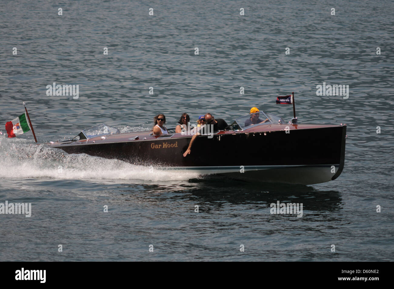 Laghi Italiani, Garwood Classic barca, Lago di Como, Italia, Giugno 2009. Garwood classico motore veloce lancio attraversando il lago di Como, Italia. Foto Stock