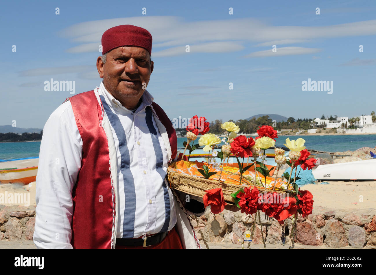 Tradizionali di fiori di gelsomino venditore Hammamet Tunisia Foto Stock