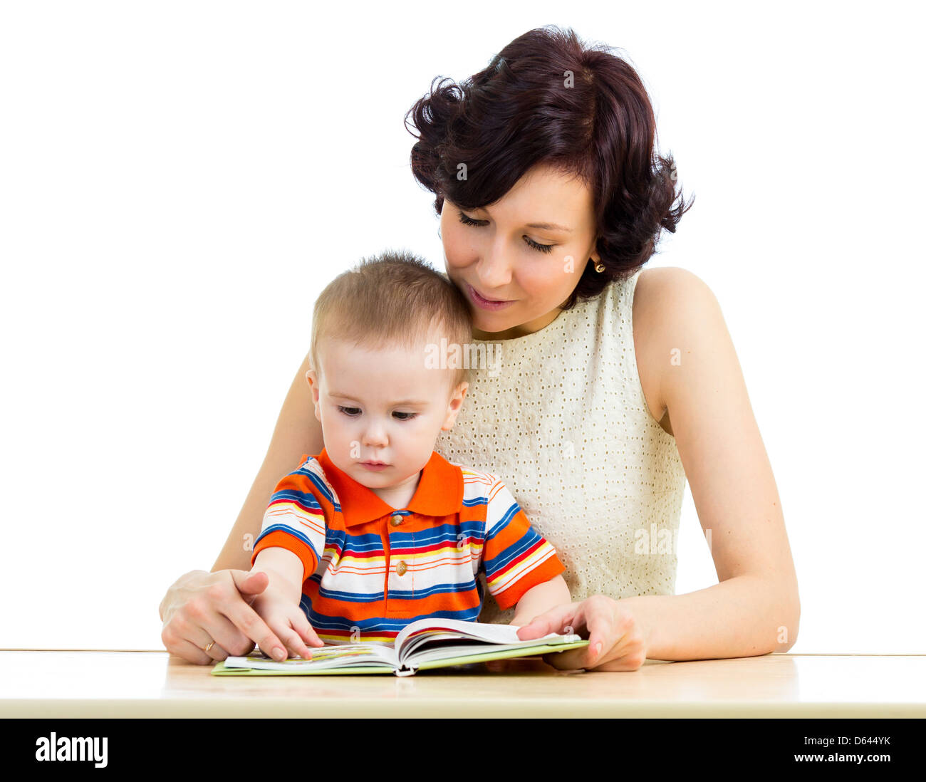 Madre la lettura di un libro bambino Foto Stock