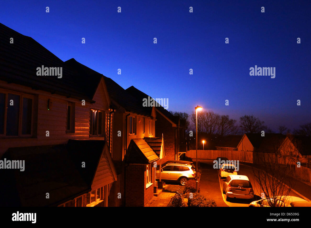 Sunrise alba hastings street lights vetture stradali tree Foto Stock