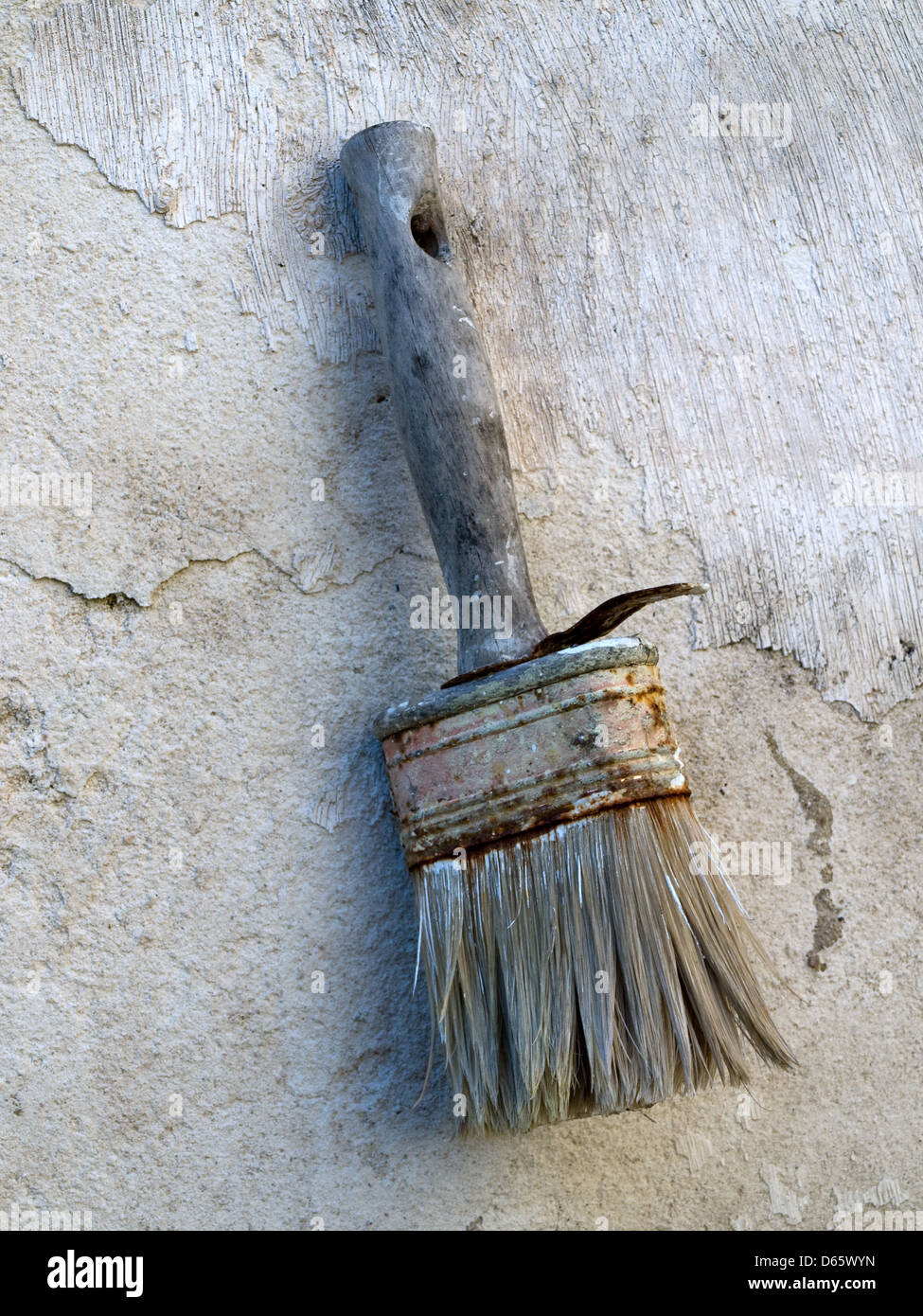 Spazzola usata sulla parete Foto Stock