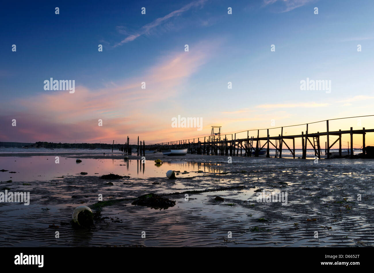 Tramonto alle barene nel porto di Poole nel Dorset guardando verso Brownsea Island Foto Stock