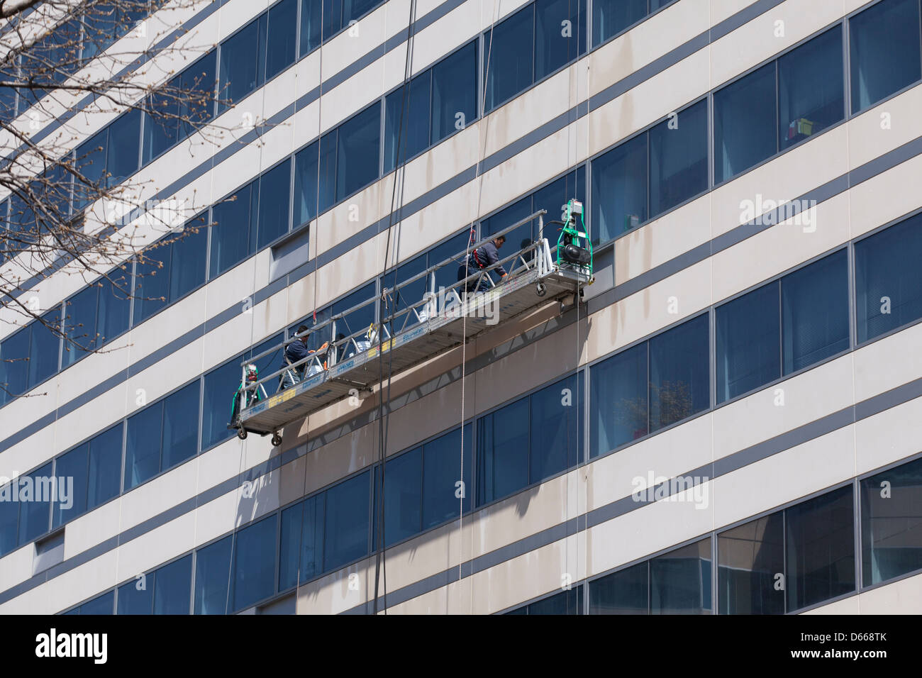 Uomini al lavoro su areale e piattaforma di lavoro - USA Foto Stock