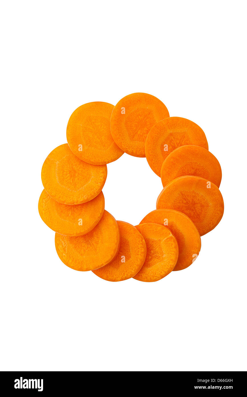 Fette di arancia sana carota disposti in cerchio. Foto Stock