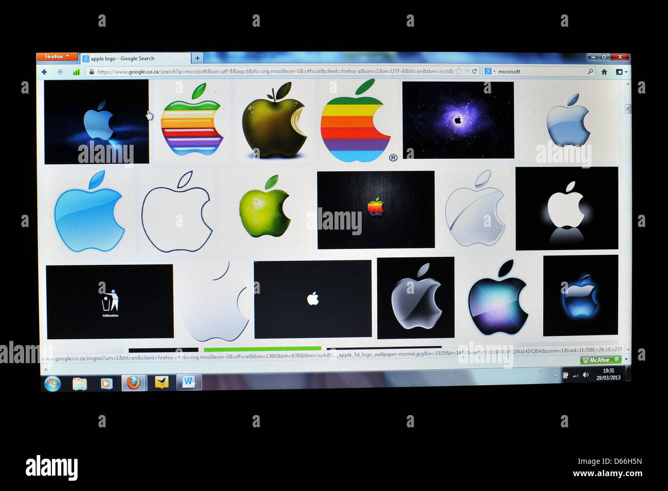 Immagine di un computer portatile schermo che mostra i risultati di una ricerca di immagini con Google per la Apple Computer Company. Foto Stock