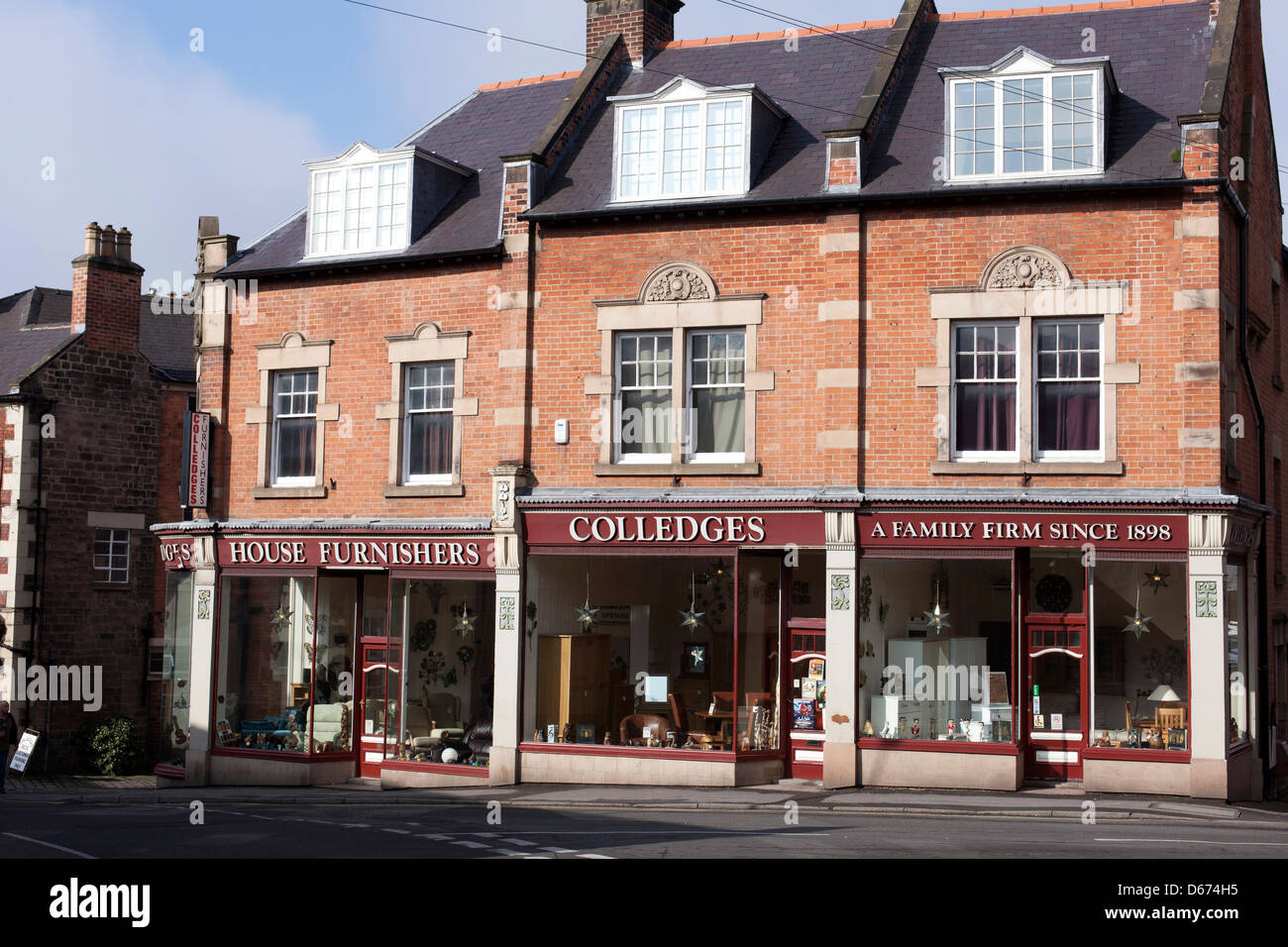 Colledges furniture store stabilito 1898, Luogo di mercato, Belper, Derbyshire, England, Regno Unito Foto Stock
