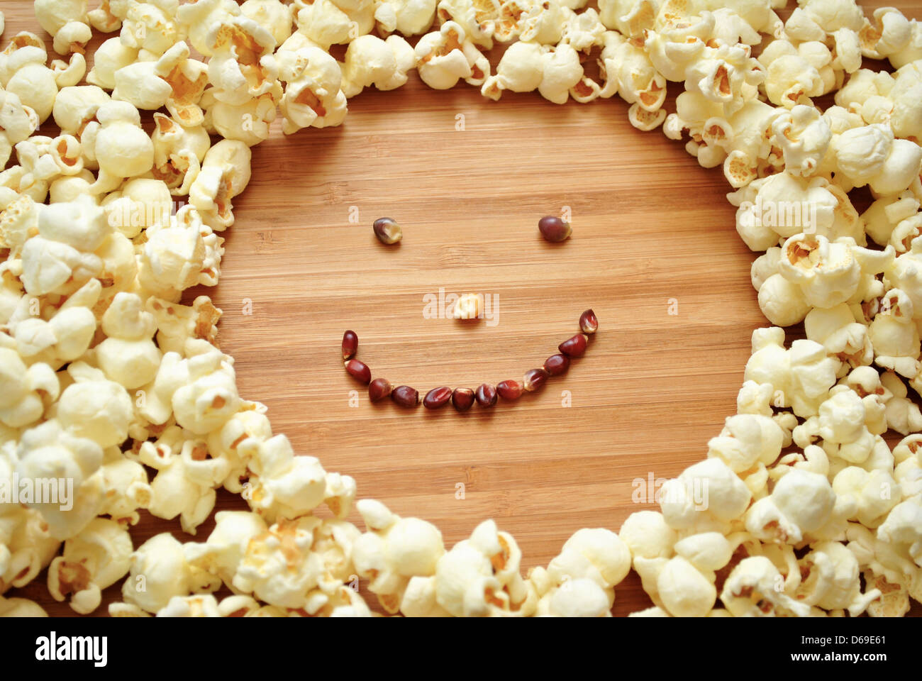 Faccia felice di popcorn Foto Stock