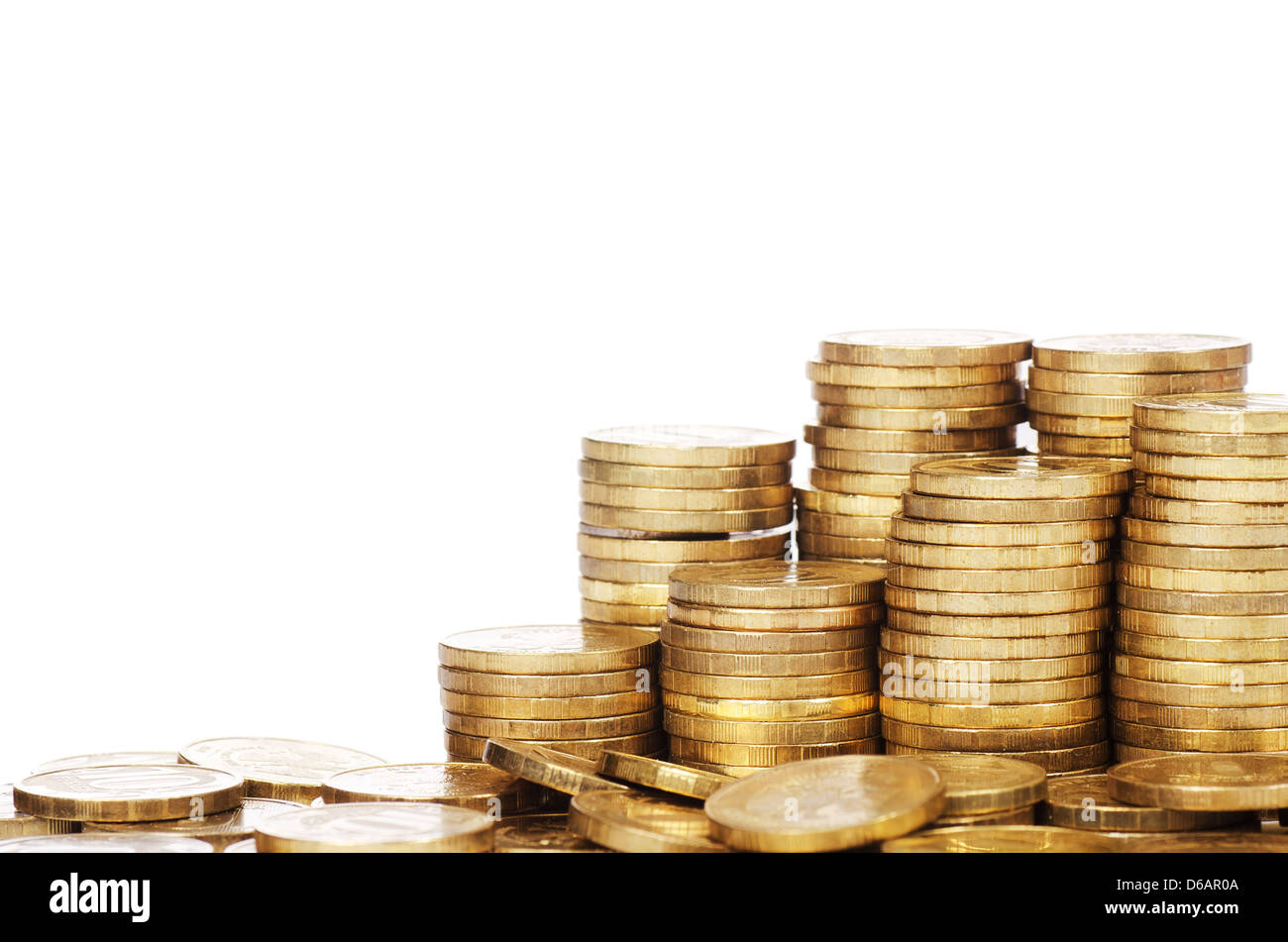 Stock di monete d'oro isolato su bianco Foto Stock