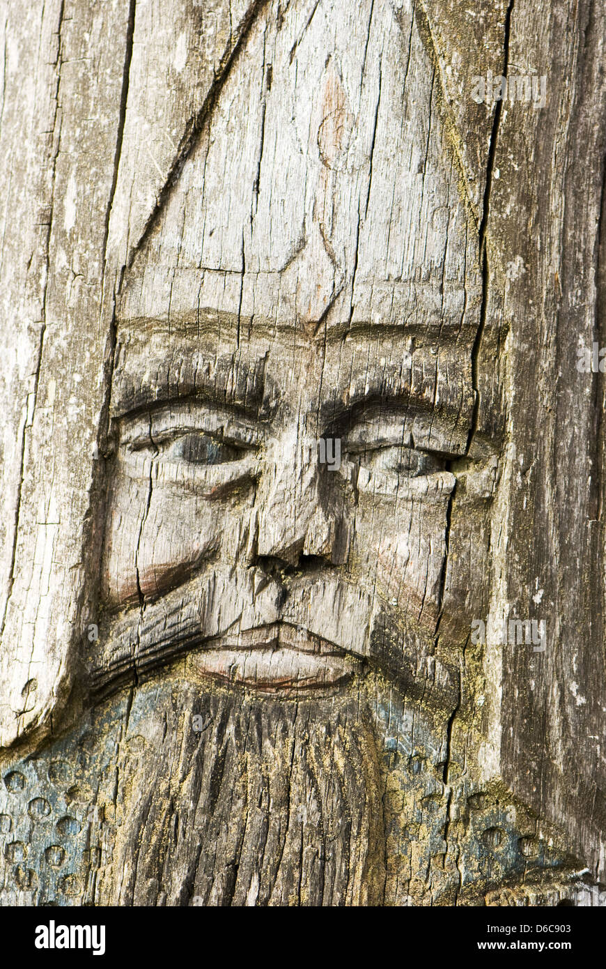 Faccia di eroe, glyphic su legno Foto Stock