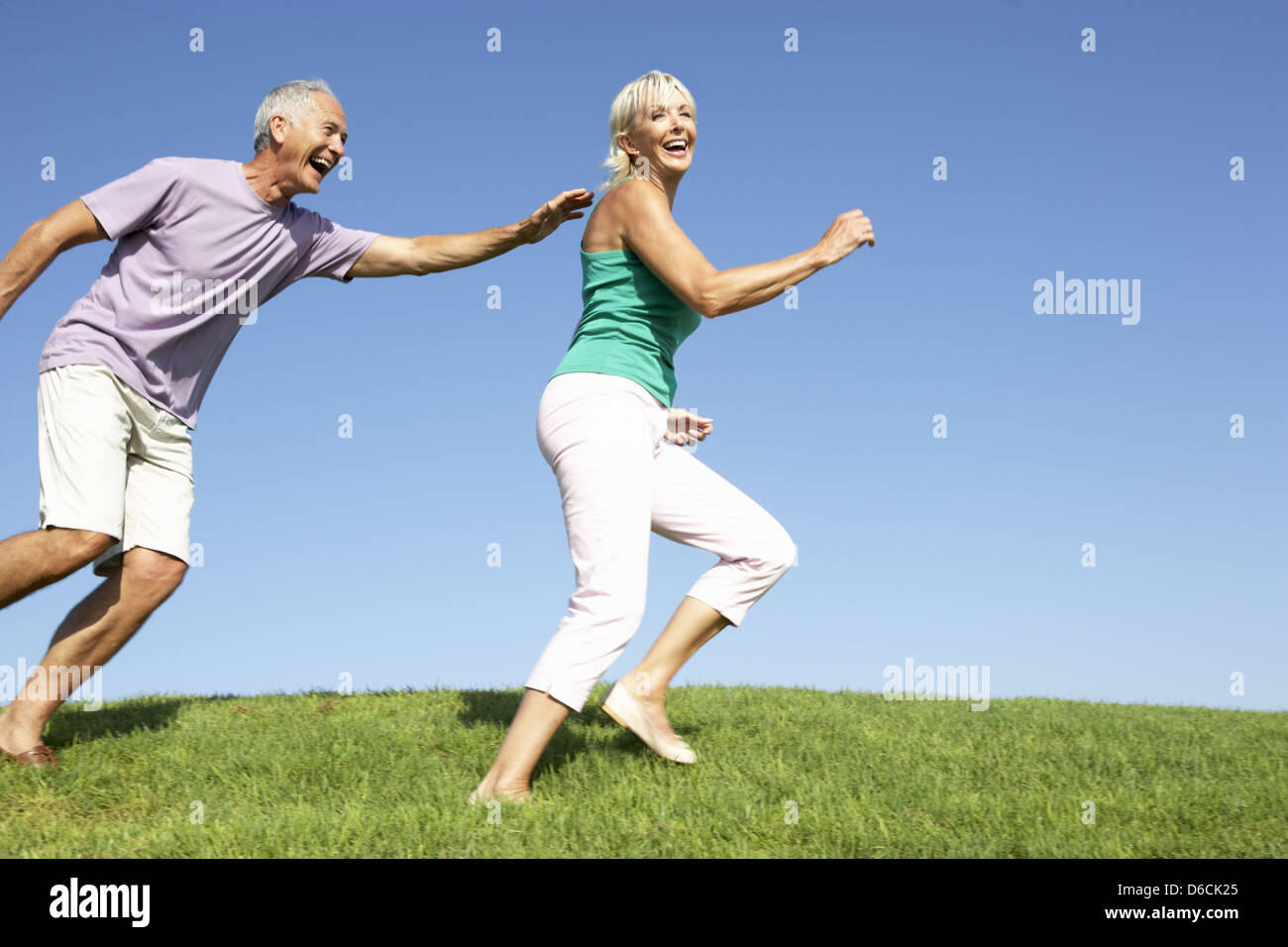 Gioco di cattura,coppia di anziani Foto Stock
