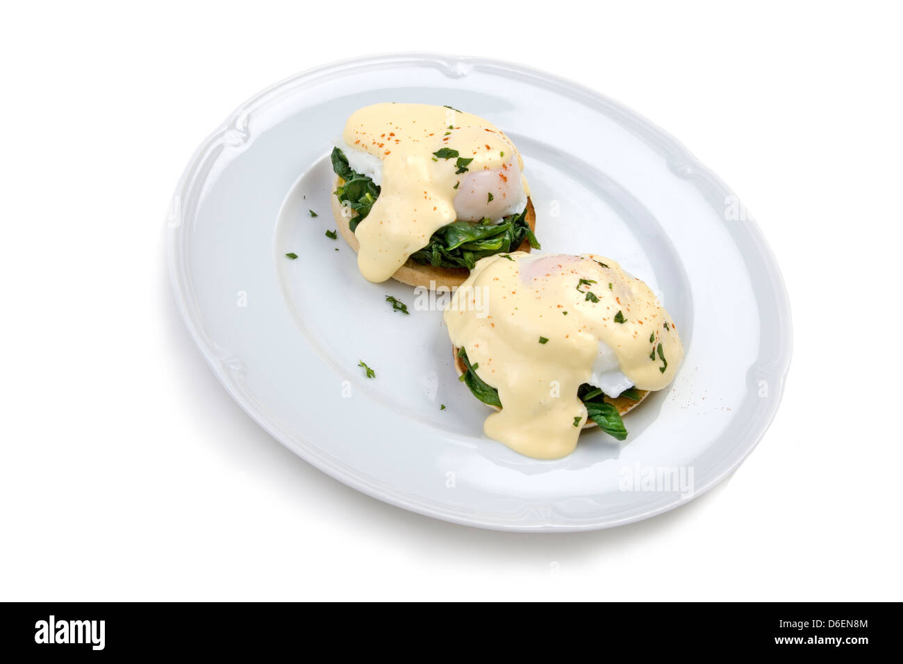 Uova Benedict con spinaci appassito Foto Stock