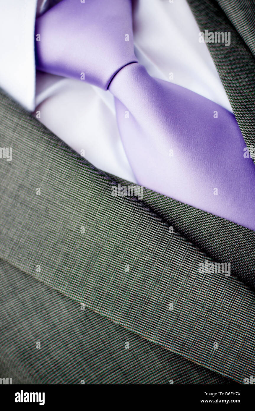 Dettaglio di imprenditore il soddisfare con il tirante Foto Stock