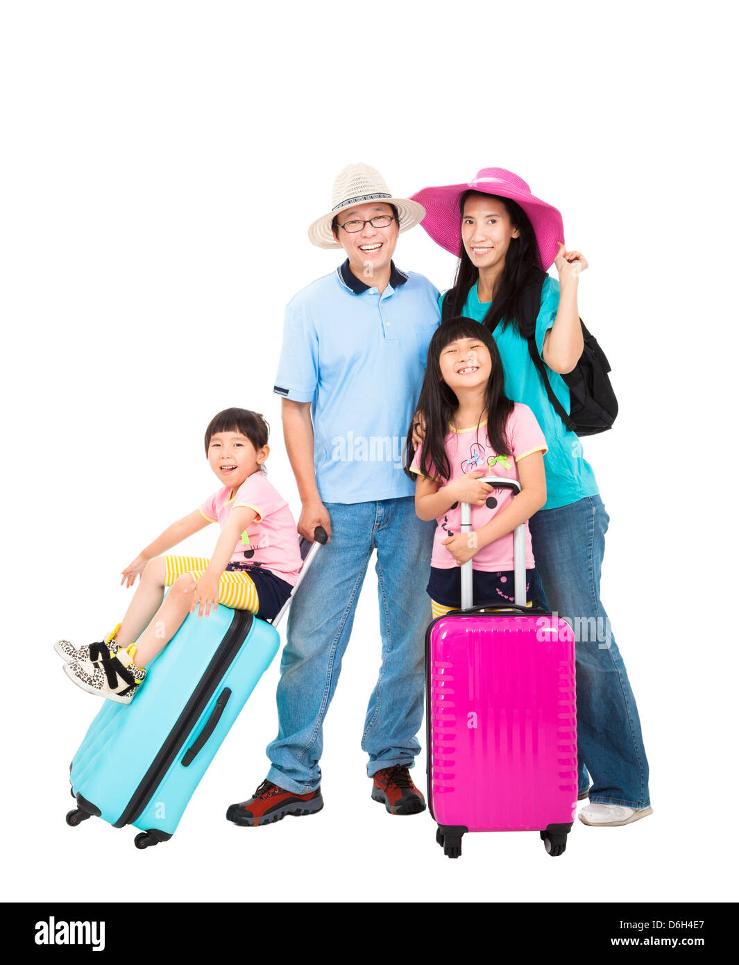 La famiglia felice con la valigia prendere vacanze estive Foto Stock
